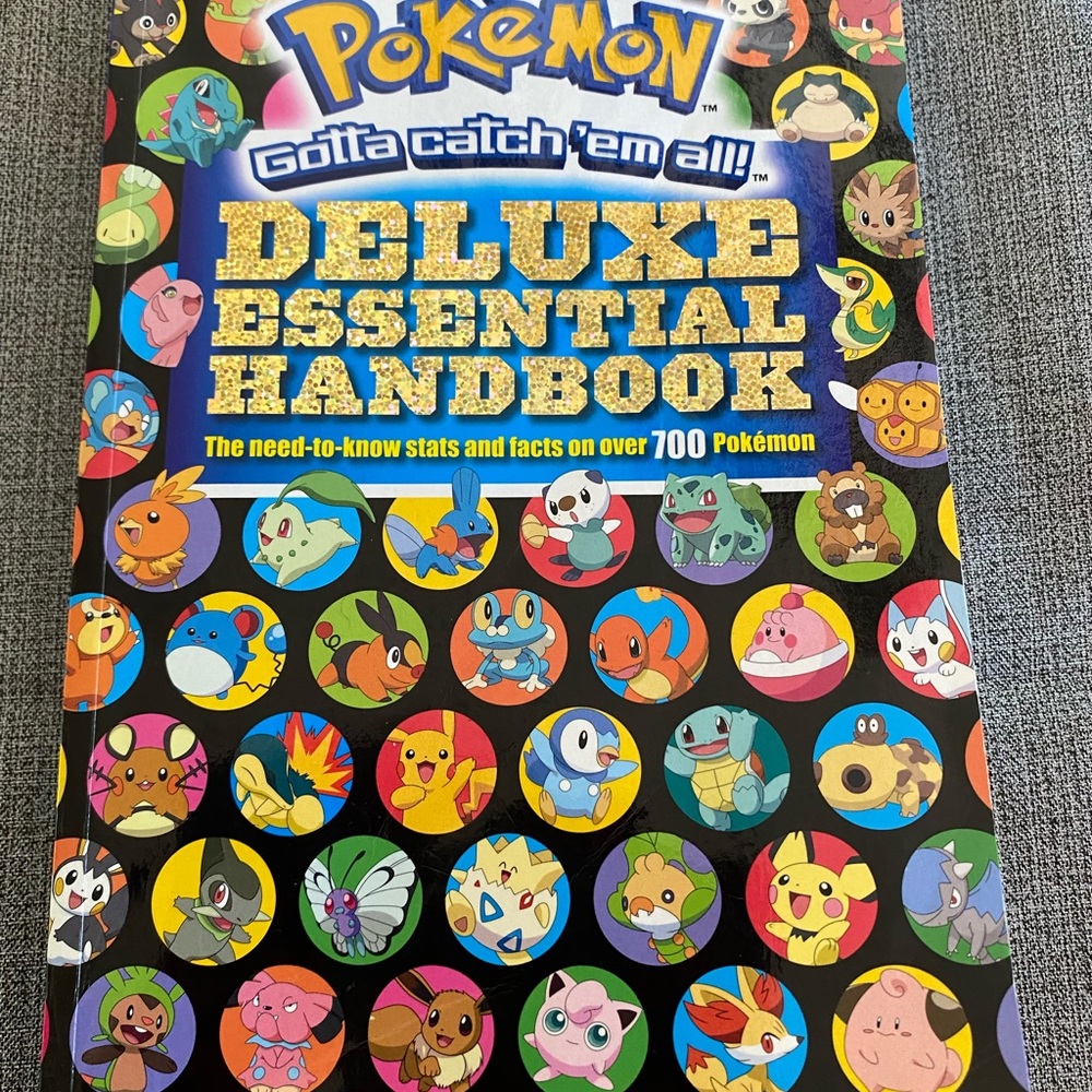 Pokemon Deluxe Essential Handbook Paperback Book